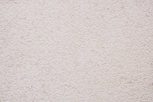 istock Light pink stucco wall texture for architecture and background design concept 2241230653