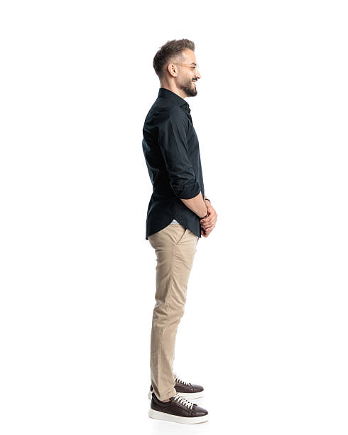 istock happy young man with glasses looking to side and standing in line 2241230730