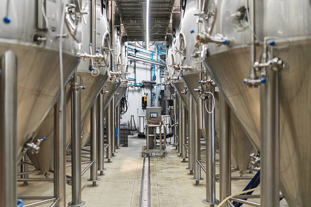istock Beer fermenting tanks in a modern craft beer brewery 2241232946