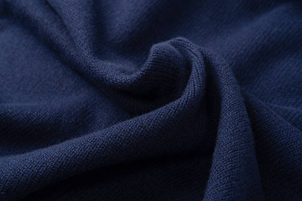 istock Navy blue merino wool sweater texture as background. Top view. 2241233688
