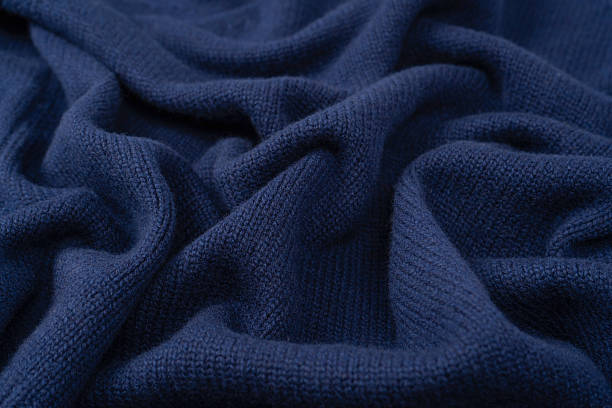 istock Navy blue merino wool sweater texture as background. Top view. 2241233690