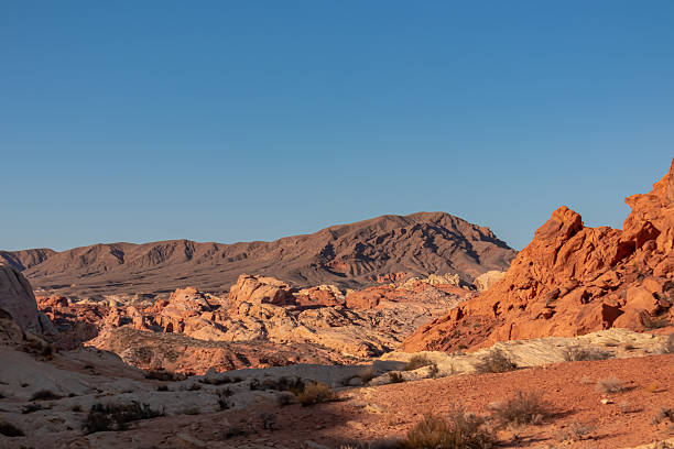 istock Valley of Fire - Scenic view of striated red and white Aztek sandstone rock formations, Nevada, USA. 2241237962
