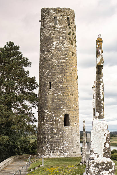 istock Ancient stone tower rises amidst scenic landscape 2241244763