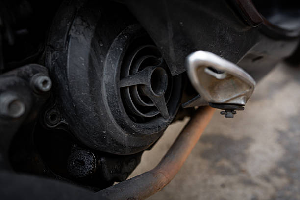 istock Close-up of dusty scooter engine and exhaust system 2241244931