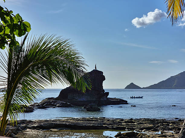 istock Fijian Warrior Standing on Rock in Kuata 2241245702