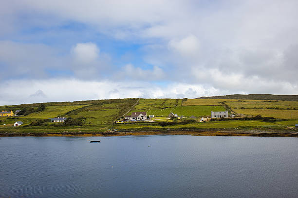 istock Serene Irish coastal village under moody cloudy sky 2241246652