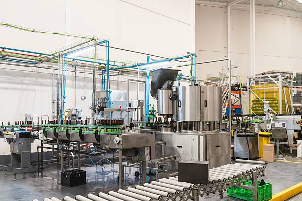 istock Beer bottles moving on conveyor belt in brewery 2241249865