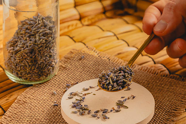 istock Hand Scooping Dried Lavender Buds for Herbal Tea 2241254777