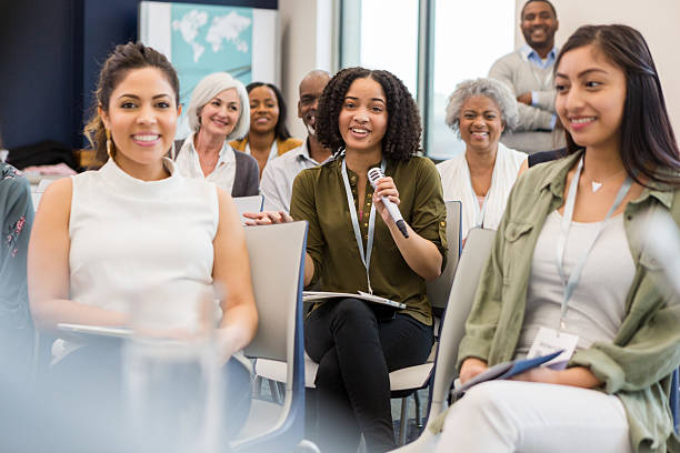 istock Diverse group of people actively participating in a business meeting, sharing ideas. 2241257231