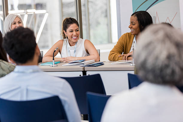 istock Diverse group of professionals engaged in lively discussion at a panel or meeting. 2241257322