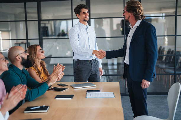 istock Business partners shaking hands after reaching agreement 2241264693