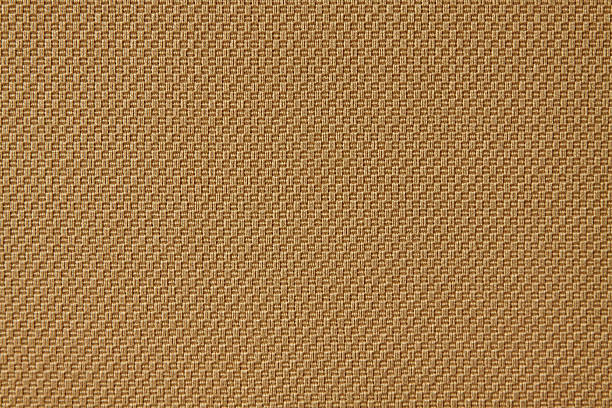 istock Textured background featuring a warm, earthy tone with a subtle woven pattern, ideal for various design projects, providing ample copy space for text or graphics 2241264840