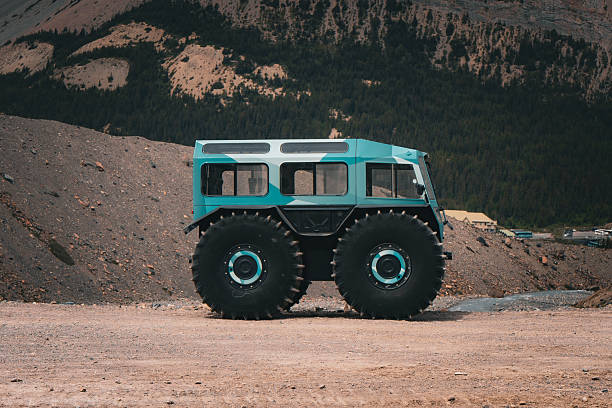 Off-road vehicle with oversized tires. Athabasca Glacier, Columbia Icefield, AB