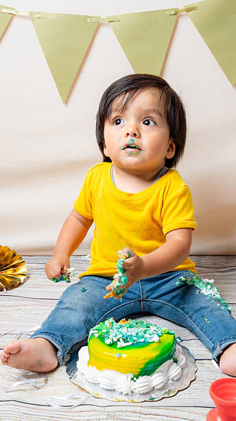 istock Baby enjoying a messy cake smash celebration 2241270553