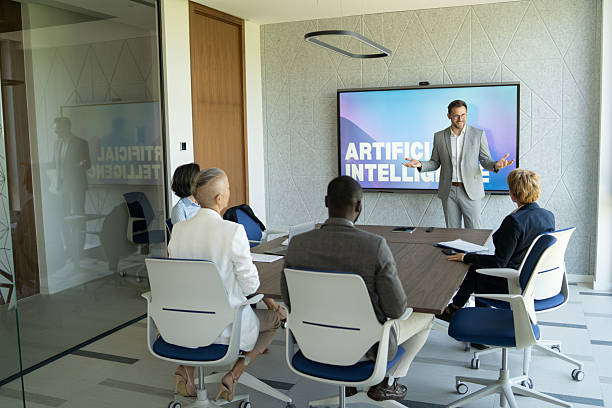 istock Businessman giving presentation about artificial intelligence to his colleagues in the office 2241286202