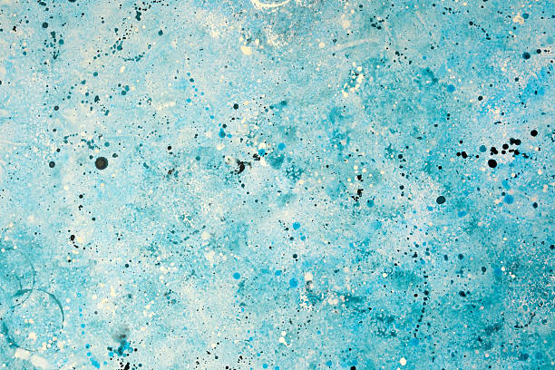 istock Abstract blue painting with splashes of color and texture on canvas surface 2241287181