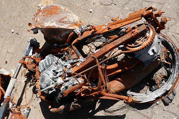 istock A motorcycle is on the ground with a black chain and a black tire 2241289697