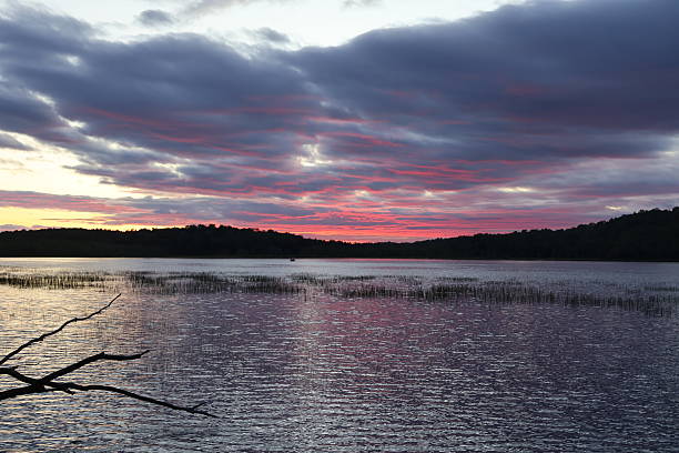 istock Red Sunset Over a Lake in the Adirondacks 2241291673