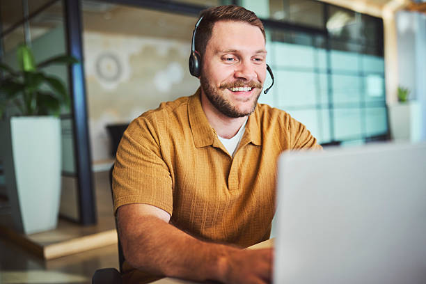 istock Happy Caucasian Professional with Headset Smiling During Video Call 2241294252