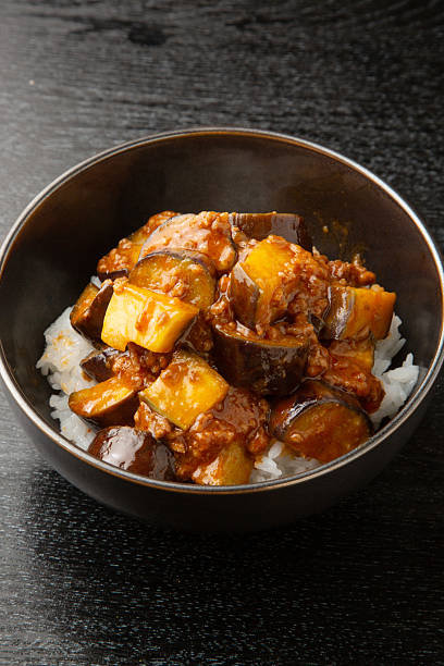 istock Eggplant , minced meat,miso Stir-fry  on  a rice bowl 2241303457