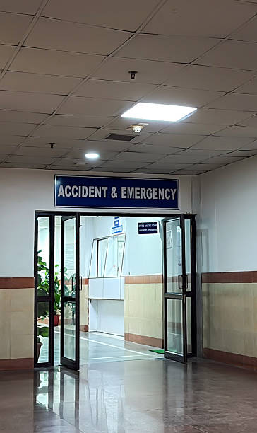 emergency room entrance with accident and emergency signage in hospital hallway