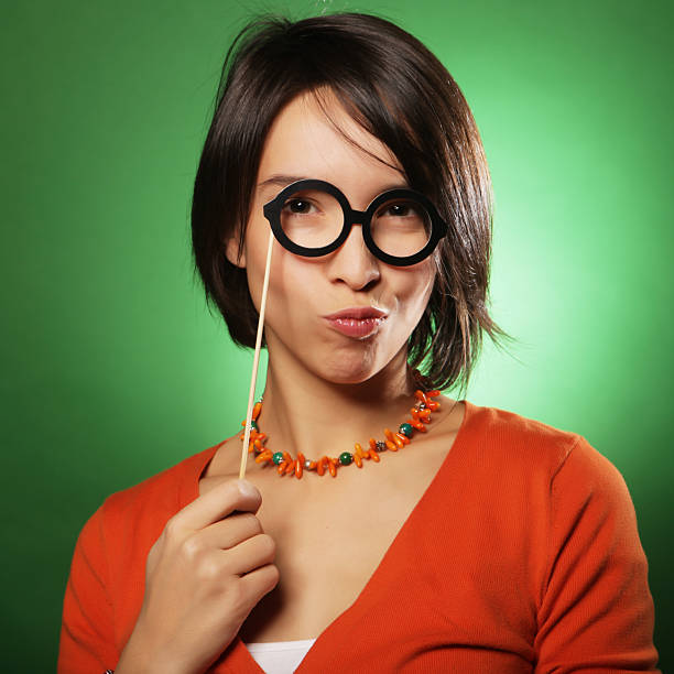 Attractive playful young woman ready for party