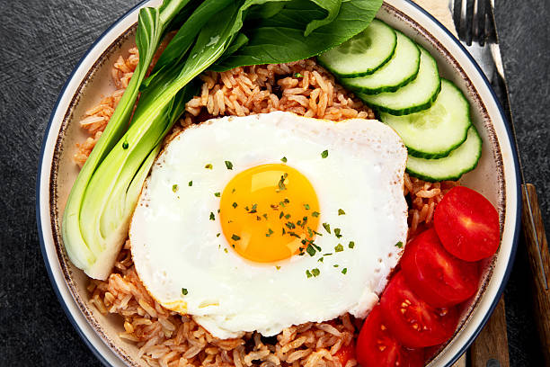 istock ndonesian nasi goreng (fried rice) served on a plate. 2241317144