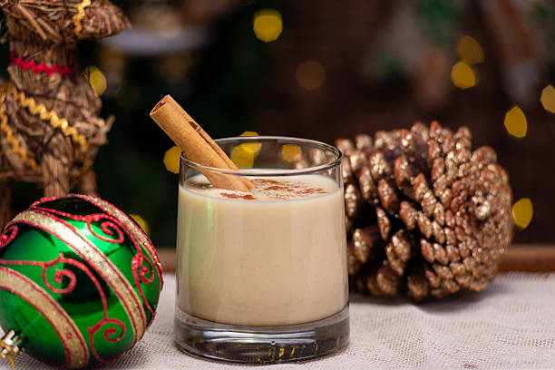 istock Festive Christmas Eggnog with Cinnamon Stick and Holiday Decorations. Still Life 2241321024