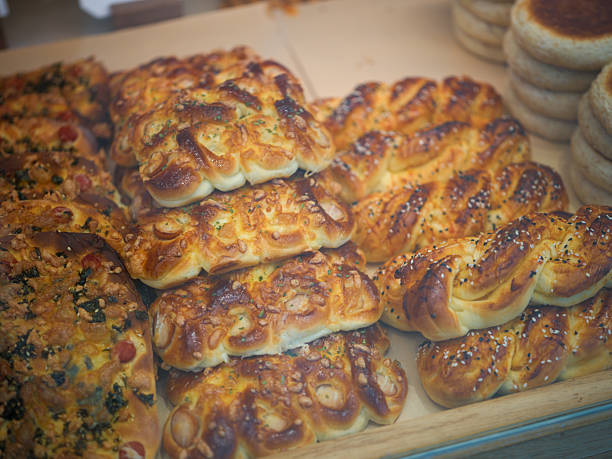 istock A Display of Freshly Baked Assorted Bread Varieties Including Braided Rolls and Savory Loaves 2241322816