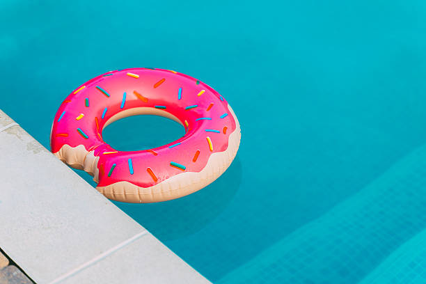 istock Donut-shaped inflatable in a swimming pool 2241325798