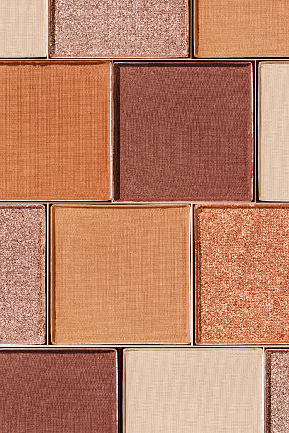 istock Swatches eyeshadow refills as minimal graphic pattern. Matte and glitter pans beige brown copper shade, detailed texture, sun light, minimal trend cosmetics background, beauty product, eye makeup 2241325966