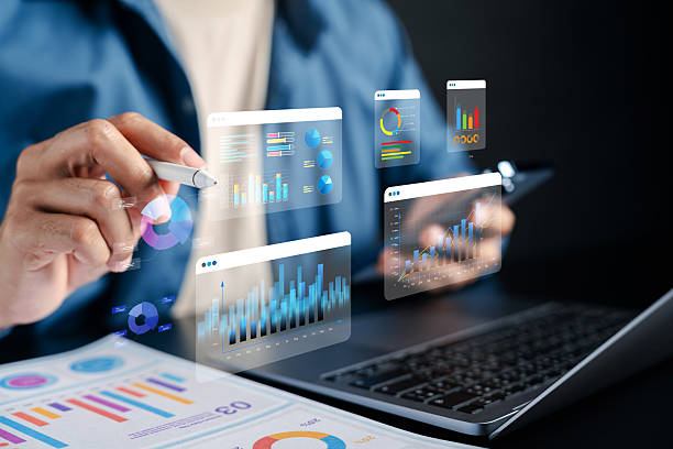 istock Businessman analyzing financial data and digital graphs technology, planning investment strategy, marketing analytics, and finance growth. 2241330938