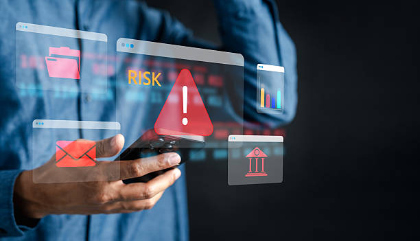 istock Financial risk and cybersecurity with red warning, risk alert message, and digital banking fraud, data breach, and online threats. 2241330939