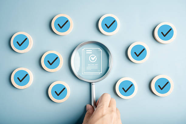 istock Online survey and digital form with checklist and approval process under magnifying glass, compliance, verification, feedback, registration, and document management in business workflow. 2241330943