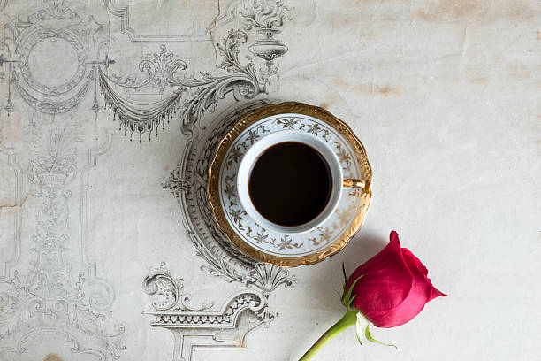 istock cup of coffee with rose 2241333156