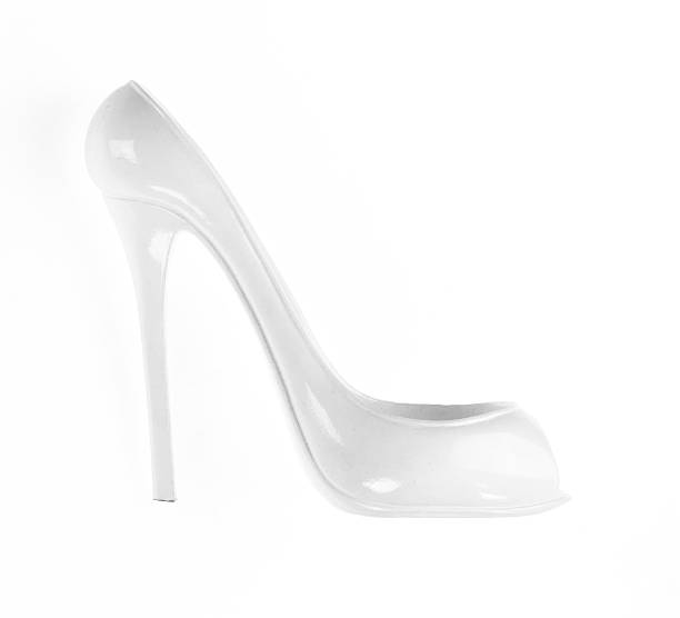 White plastic high-heeled shoe isolated on white background