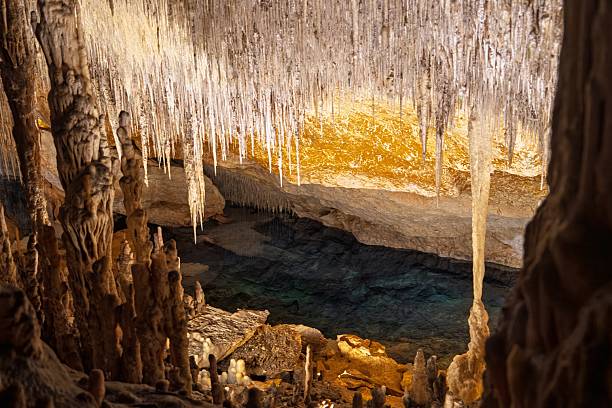 istock Stalactites and Crystal Clear Water Inside a Stunning Mallorica Cave Location 2241337657