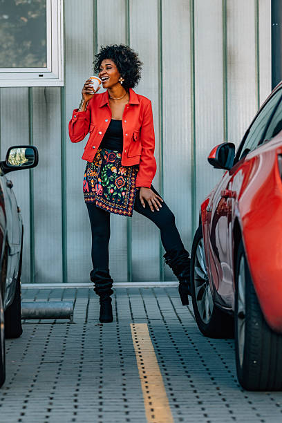 woman on the street drinking coffee