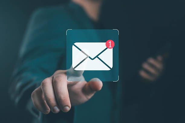 istock Businessman touching new email notification icon on virtual screen, concept of digital communication, online marketing, message alert, technology connection, and smart business network. 2241345432