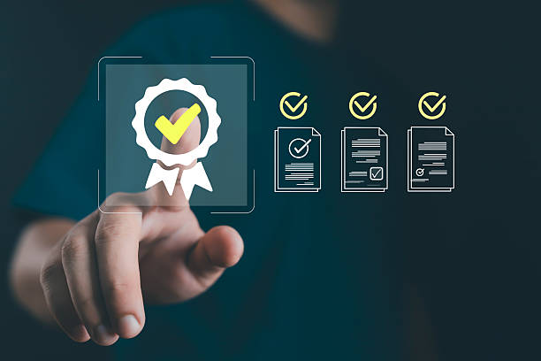 istock Business person touching virtual certification icon, concept of quality assurance, document approval, compliance management, verified process, and trusted digital business system. 2241345996