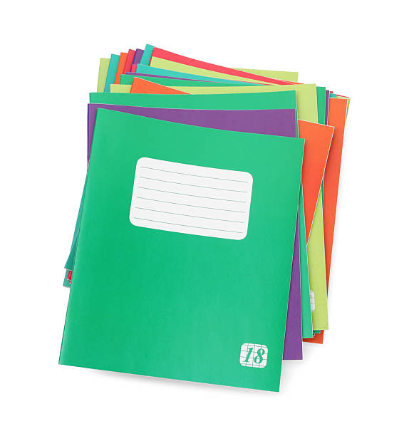 istock Stack of colorful copybooks isolated on white, top view. School stationery 2241349943