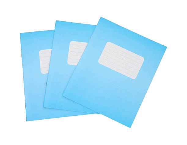 istock Blue copybooks isolated on white, top view. School stationery 2241350542