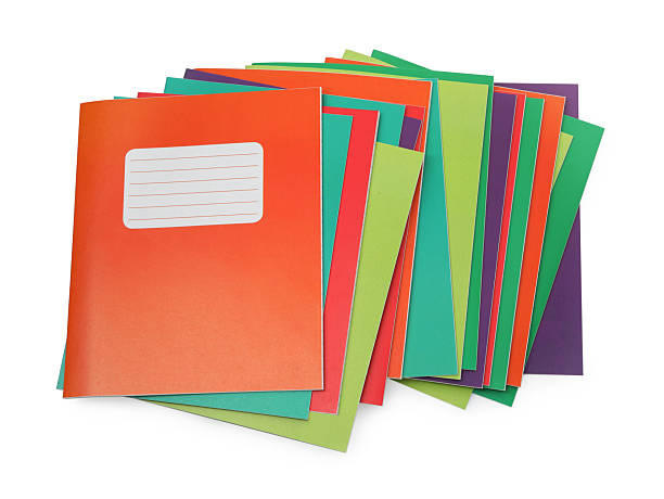 istock Colorful copybooks isolated on white, top view. School stationery 2241350548