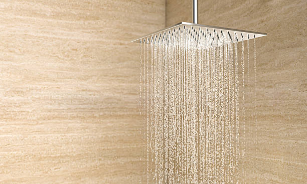 istock Water falling from modern square shower in bathroom 2241351311