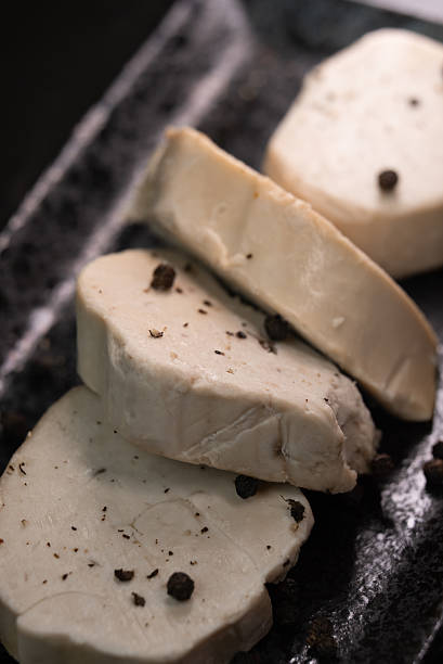 istock Seared foie gras delicacy, generously seasoned with coarse black pepper, creating a visually striking and rich texture contrast, ready for fine dining enjoyment 2241351709