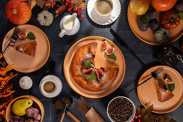 istock Autumn pumpkin pie with figs, berries and coffee flat lay 2241352029