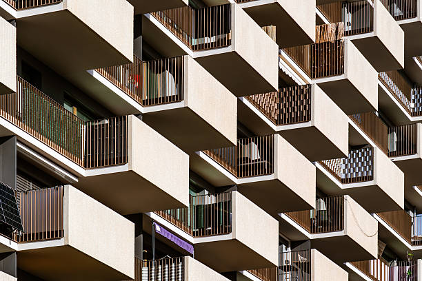 architecture, residential, building, balconies, concrete, facade, modern, housing, structure, design, geometry, pattern, repetition, symmetry, exterior, urban, contemporary, construction, detail, minimalism, elevation, innovation, apartment, texture, rhythm, perspective, material, city, development, modernism, architectural, environment, living, housing, contrast, form, depth, light, structure, design, architecture, composition