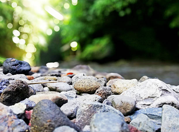 Natural stone foreground, with nature blurry background. Natural background concept