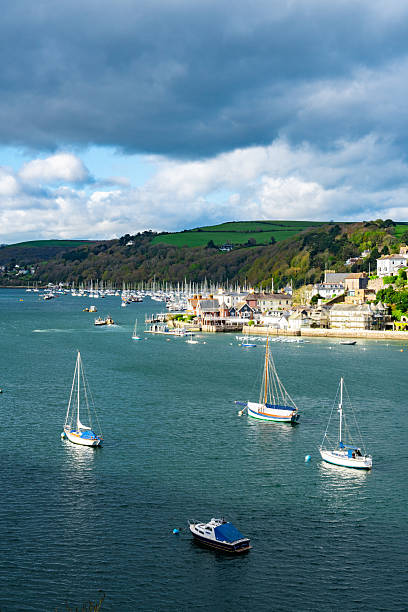 istock Dartmouth waterfront and harbor with boats on river dart 2241358562