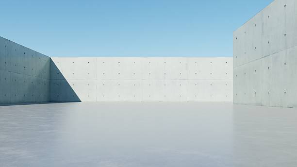 istock 3d render of abstract modern concrete architecture background, Minimal geometry architectural design, Car presentation backdrop with empty concrete floor, Geometric white blocks building design 2241360539